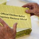 Workers sort mail ballots on primary Election Day 2024 at Northampton County Courthouse in Easton, Pennsylvania.