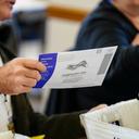 Workers sort mail ballots on Nov. 5, 2024, at Northampton County Courthouse in Easton, Pennsylvania.