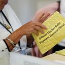 Workers sort mail ballots on primary Election Day 2024 at Northampton County Courthouse in Easton, Pennsylvania.