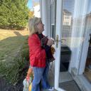 Elizabeth Moro, a state House candidate, knocks on doors in West Chester a week before the Nov. 5 election.