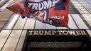 A Trump 2024 flag is raised outside of Trump Tower on July 14, 2024, in New York.