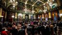 The floor of the Pennsylvania Senate with members at attention.