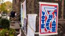 Voting signs in Philadelphia in 2021. In odd-year elections like these, many local candidates cross-file.