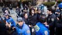 Police detain Emir Balat outside Gracie Mansion, Saturday, March 7, 2026, in New York.