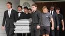 Pallbearers carry a casket containing the remains of Glenwood "Bubba" Pysher IV, who was killed by police in Pottstown, PA.