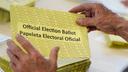 Workers sort mail ballots on primary Election Day 2024 at Northampton County Courthouse in Easton, Pennsylvania.