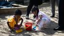 Children at Shady Lane School in Pittsburgh play in a sandbox.