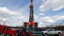 Work continues at a shale gas well drilling site in St. Mary's, Pa., March 12, 2020.