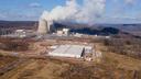 A data center owned by Amazon Web Services, front right, is under construction next to the Susquehanna nuclear power plant in Berwick, Pa., on Tuesday, Jan. 14, 2024.