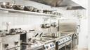 A stock image of a restaurant kitchen.