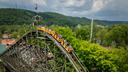 Riders on Knoebels’ Phoenix roller coaster begin their descent.