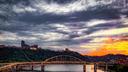 A panoramic view of a Pittsburgh bridge on a cloudy day