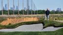 Cobbs Creek Foundation COO Enrique Hervada poses for a photograph at the Cobbs Creek Golf Club during construction in Philadelphia, Tuesday, May 12, 2026.