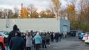 Voters stand in line at Belle Valley Fire Department in Erie County waiting to vote in person on Nov. 3, 2020.