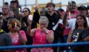 Family, friends and community attend a candlelight vigil for Corey Comperatore at Lernerville Speedway in Sarver, Pennsylvania.