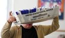 Workers sort mail ballots on Nov. 5, 2024, at Northampton County Courthouse in Easton, Pennsylvania.
