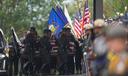 Pallbearers carry the coffin of a slain officer during funeral services for Northern York County Regional Police detectives in Red Lion, PA