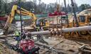 Pipefitters, left, work to connect a long segment of pipe that is being suspended in air to make it ready to be pulled undergroud in a residential area of West Chester, PA on Ship Road and South Pullman Drive as part of the Mariner East Pipeline that is going through the area on November 11, 2019.