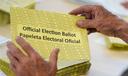 Workers sort mail ballots on primary Election Day 2024 at Northampton County Courthouse in Easton, Pennsylvania.