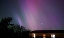 The northern lights and moon in Somerset County.