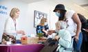 Women speak at a 2023 senior health fair in Moosic, Pennsylvania.