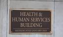 A placard outside the Pennsylvania Health & Human Services building in Harrisburg.