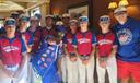 Mayor JoJo Burgess of Washington, Pa., poses with the Washington County baseball team.
