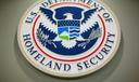 The Department of Homeland Security logo during a news conference in Washington, Feb. 25, 2015.
