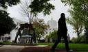 A person walks by a Liberty Bell replica at the Oregon state Capitol on Tuesday, April 14, 2026, in Salem, Ore.
