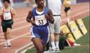 Loretta Claiborne runs during the 1999 Special Olympics World Summer Games in North Carolina.