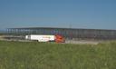 A large warehouse rises along Interstate 81 near Greencastle, PA, in 2021.