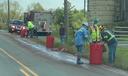 A crew cleans slaughterhouse waste that spilled along a rural road in central Pennsylvania in 2021.