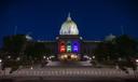 LGBTQ pride colors are displayed on the state Capitol in Harrisburg, Pennsylvania.