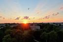 The sun over Old Main on Penn State’s University Park campus