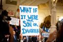 A sign at a 2018 Capitol rally in favor of opening a two-year window for civil lawsuits.