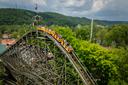 Riders on Knoebels’ Phoenix roller coaster begin their descent.