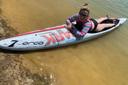 Amanda Parezo rides a paddleboard
