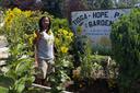 Philadelphia Gardener Estelle Vaughn stands among plants