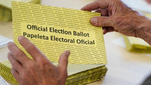Workers sort mail ballots on primary Election Day 2024 at Northampton County Courthouse in Easton, Pennsylvania. Workers sort mail ballots on primary Election Day 2024 at Northampton County Courthouse in Easton, Pennsylvania.