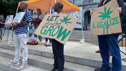 Supporters of legalizing cannabis for adult-use rally outside the state Capitol in Harrisburg on June 27, 2023