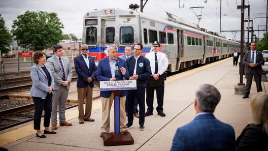 State Sen. Frank Farry (center) spoke at a May news conference to support more funding for SEPTA.