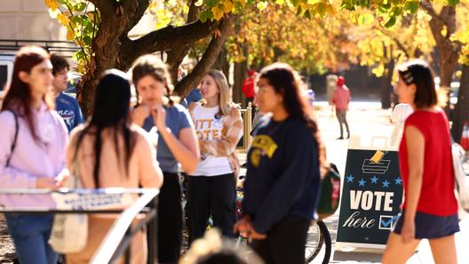College students from the University of Pittsburgh and Carnegie Mellon University enter the polling station at Bellefield Hall on Nov. 5, 2024.