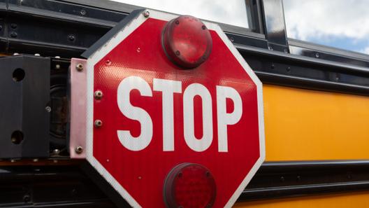 A school bus photographed during a 2024 Pennsylvania state government press conference.
