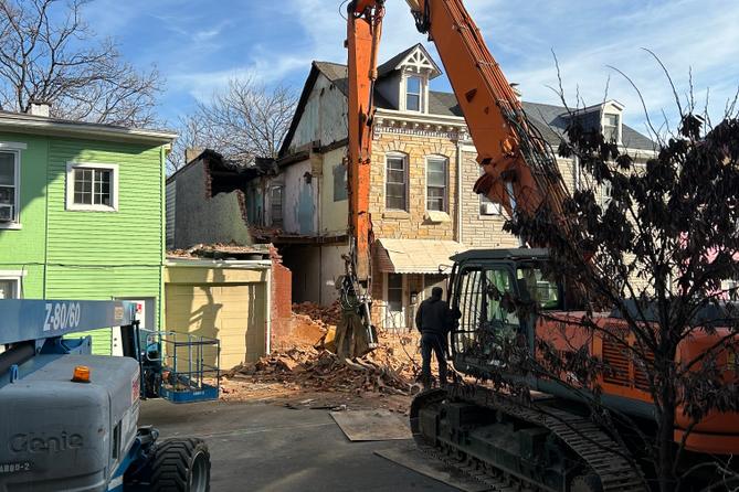 An emergency crew works to dismantle a Poplar Street home in Reading, following a partial building collapse. An emergency crew works to dismantle a Poplar Street home in Reading, following a partial building collapse.