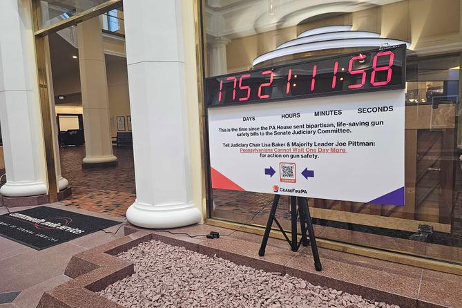 An installation at the Pennsylvania Capitol shows how many days and hours have passed since the state House passed gun control bills.