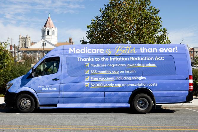 A van advertising changes to Medicare created by the Inflation Reduction Act sits outside the Heinz-Menaker Senior Ctr.