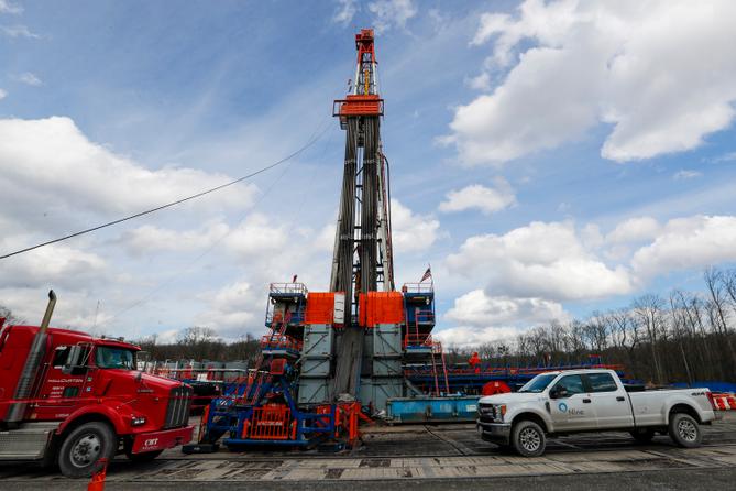 Work continues at a shale gas well drilling site in St. Mary's, Pa., March 12, 2020.