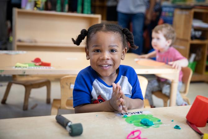 A child sits at a table at an early learning center in Pittsburgh.