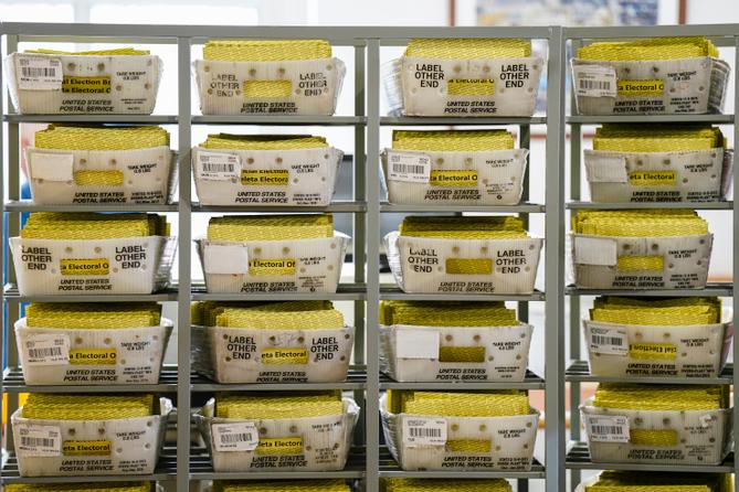 Workers sort mail ballots on Nov. 5, 2024, at Northampton County Courthouse in Easton, Pennsylvania.