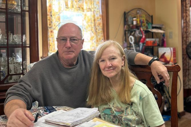 Kraig and Janet Biehl in their Perry Township home.